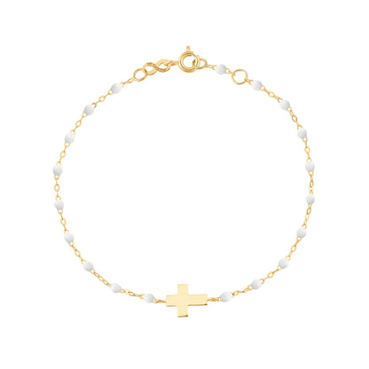 The Little Gigi Classic Cross Charm Bracelet 5.1" by Gigi Clozeau is crafted in 18k gold with small resin pearls along the chain and a flat cross charm at the center, finished with a spring ring clasp.