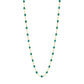The Classic Gigi Necklace 16.5" by Gigi Clozeau showcases evenly spaced oval green beads on an 18 carat yellow gold chain, offering a timeless and elegant jewelry accessory.