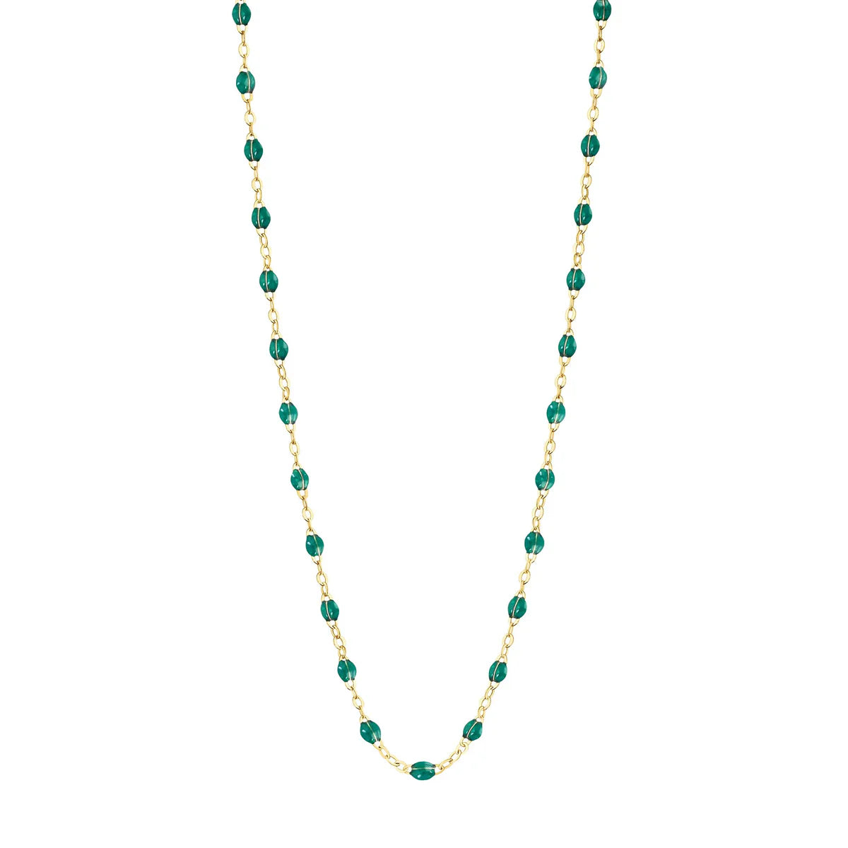 The Classic Gigi Necklace 16.5" by Gigi Clozeau showcases evenly spaced oval green beads on an 18 carat yellow gold chain, offering a timeless and elegant jewelry accessory.