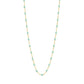 The Classic Gigi Necklace 16.5" by Gigi Clozeau features 18-carat yellow gold accented with evenly spaced small turquoise beads for a modern twist on classic jewelry.