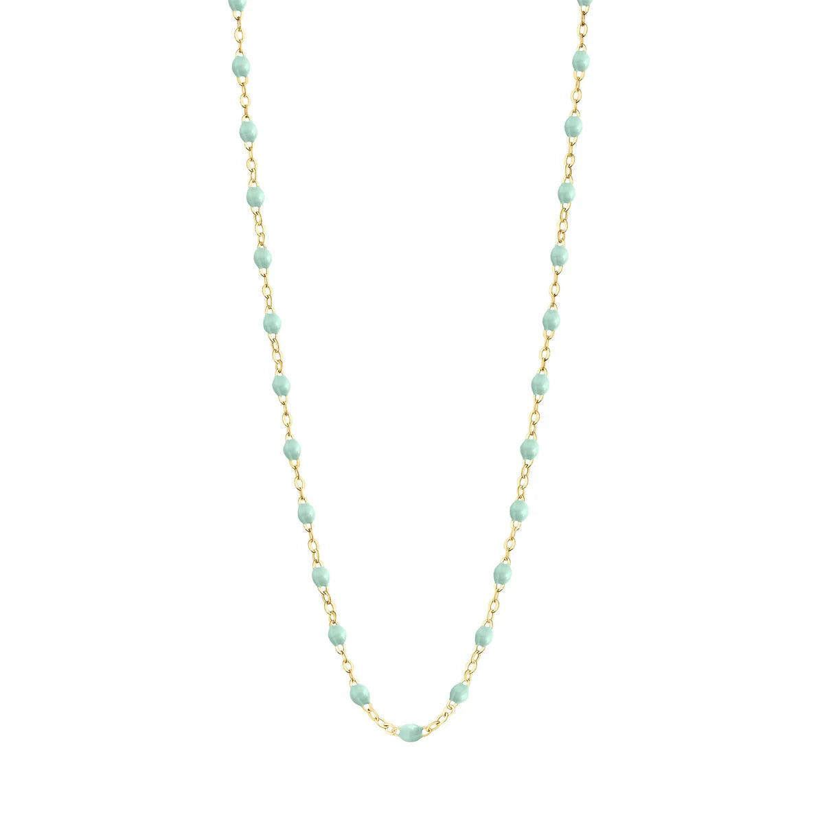 The Classic Gigi Necklace 16.5" by Gigi Clozeau features 18-carat yellow gold accented with evenly spaced small turquoise beads for a modern twist on classic jewelry.
