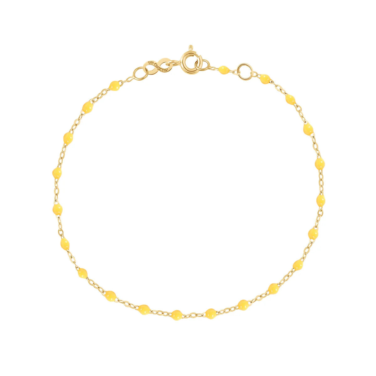 The Classic Gigi Bracelet 6.7" by Gigi Clozeau features 18k yellow gold, small yellow beads spaced along the chain, and a spring ring clasp—an elegant choice for everyday wear.
