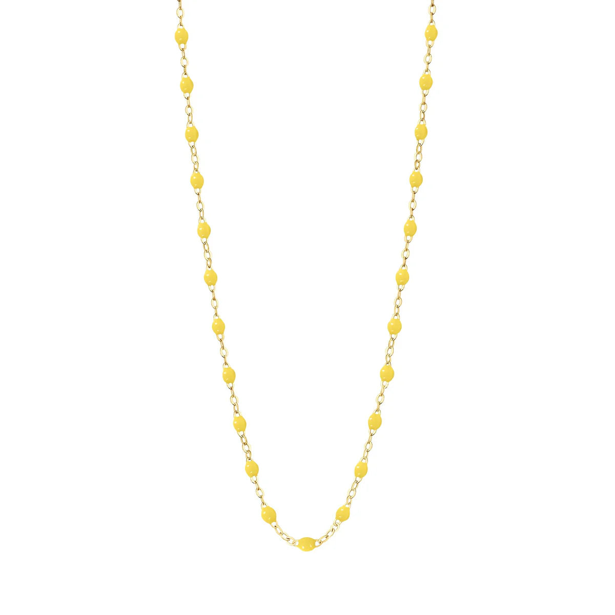 The Classic Gigi Necklace 16.5" by Gigi Clozeau is crafted in 18-carat yellow gold with evenly spaced small yellow beads, beautifully displayed on a white background.
