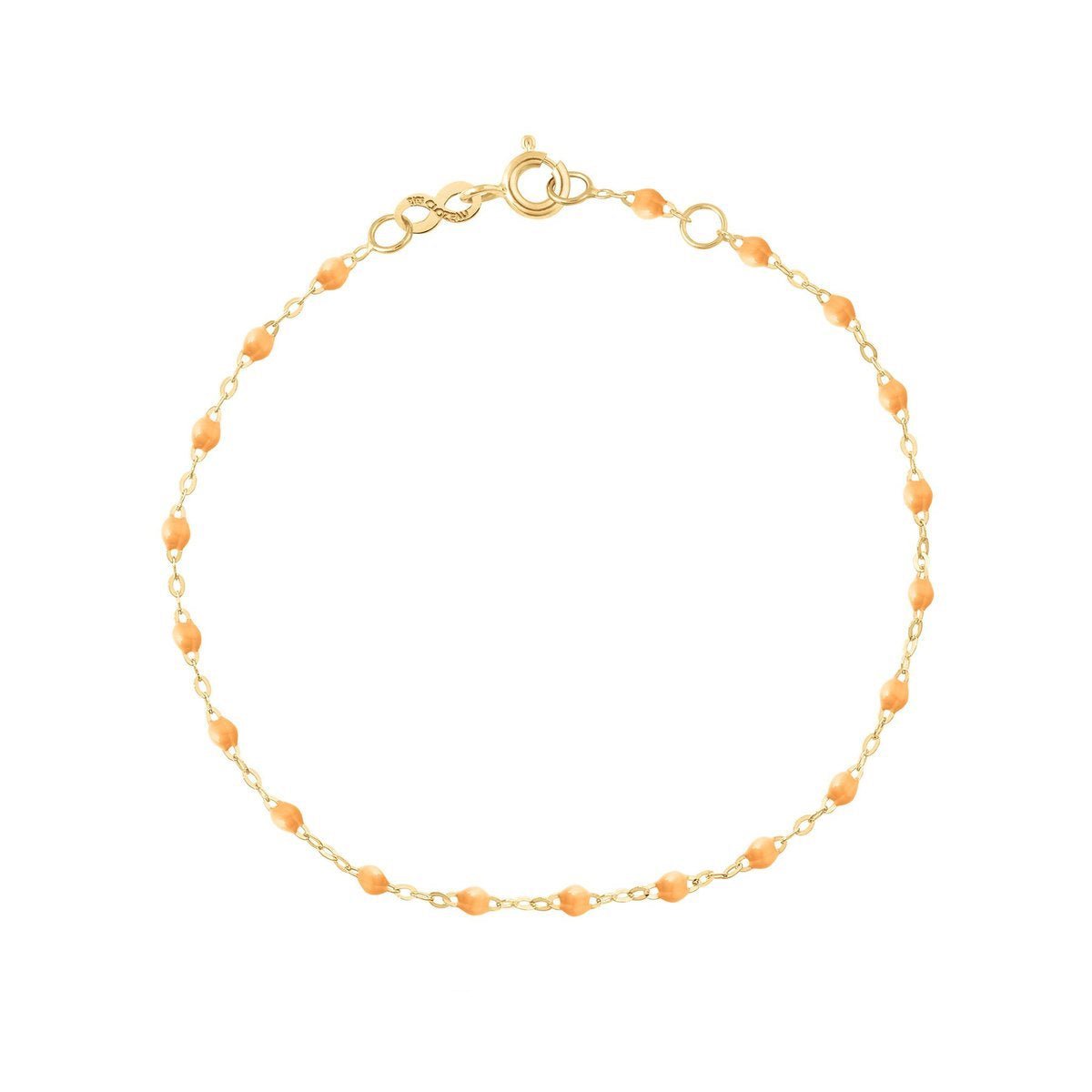 Gigi Clozeau Classic Gigi Bracelet with 18 carat Yellow Gold chain and mandarin-colored beads against a white background, perfect for an everyday look.