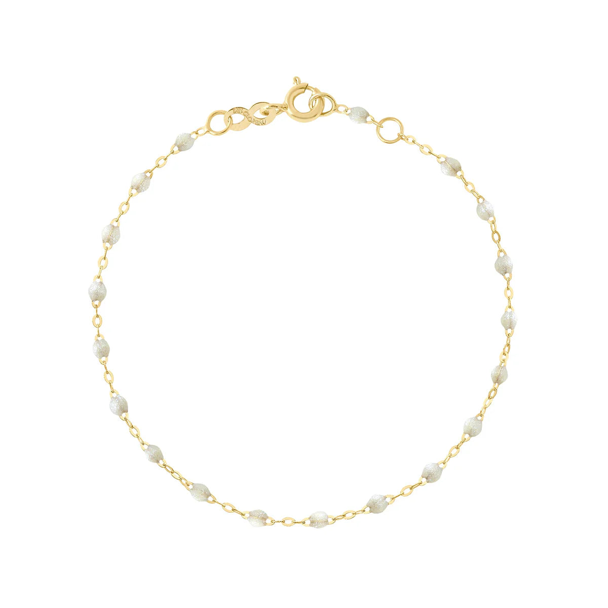The Classic Gigi Bracelet 6.7" by Gigi Clozeau is crafted in 18K yellow gold with small white beads and a spring ring clasp—an elegant choice for everyday wear.