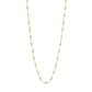 The Classic Gigi Necklace 16.5" by Gigi Clozeau features a timeless design in 18K yellow gold with evenly spaced small white pearls.