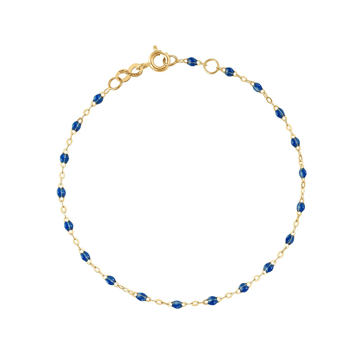 The Classic Gigi Bracelet 6.7" by Gigi Clozeau is crafted in 18k yellow gold with small blue beads and an adjustable spring ring clasp—perfect as versatile everyday jewelry.