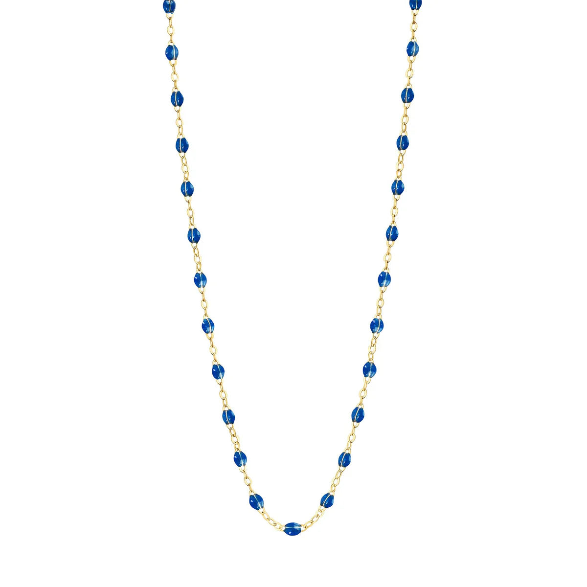 The Classic Gigi Necklace 16.5" by Gigi Clozeau is crafted in 18k yellow gold with evenly spaced blue oval beads, showcasing a timeless jewelry design against a white background.