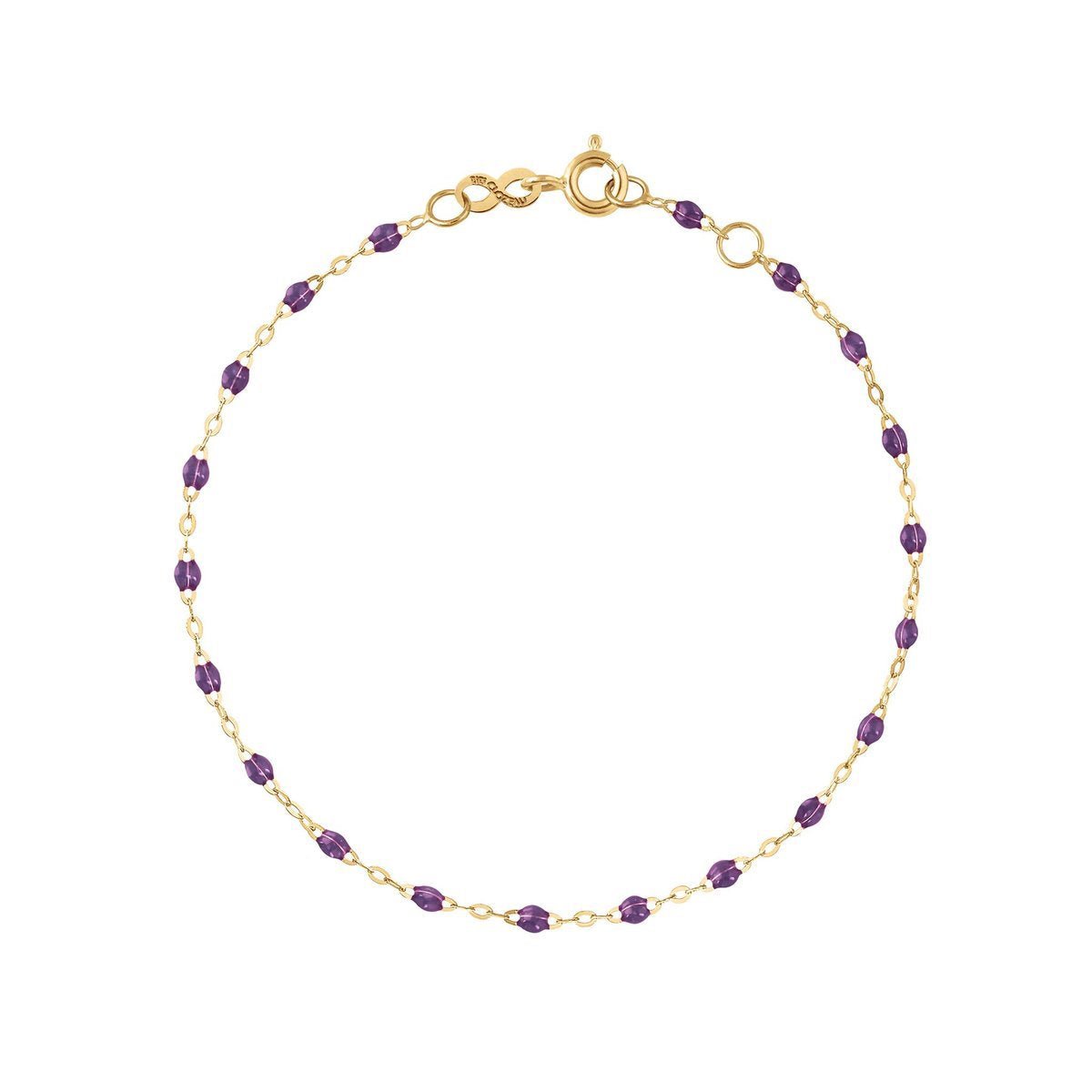 A Gigi Clozeau Classic Gigi Bracelet in 18 carat Yellow Gold with violet gemstone accents displayed against a white background.