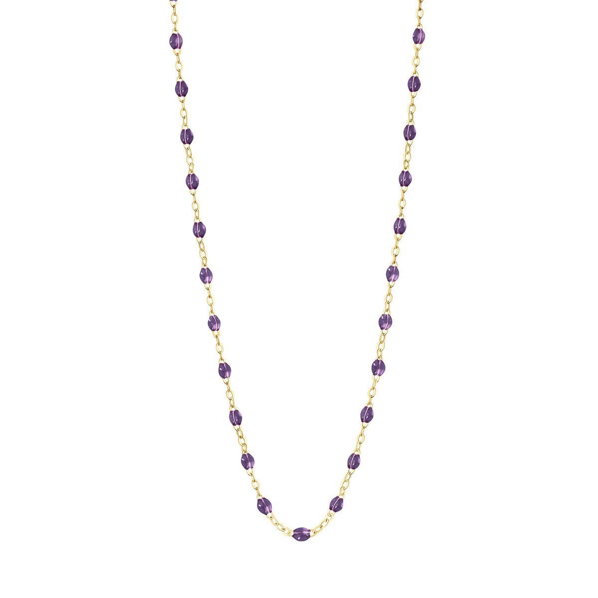 Classic Gigi Clozeau necklace with violet gemstones on a white background.