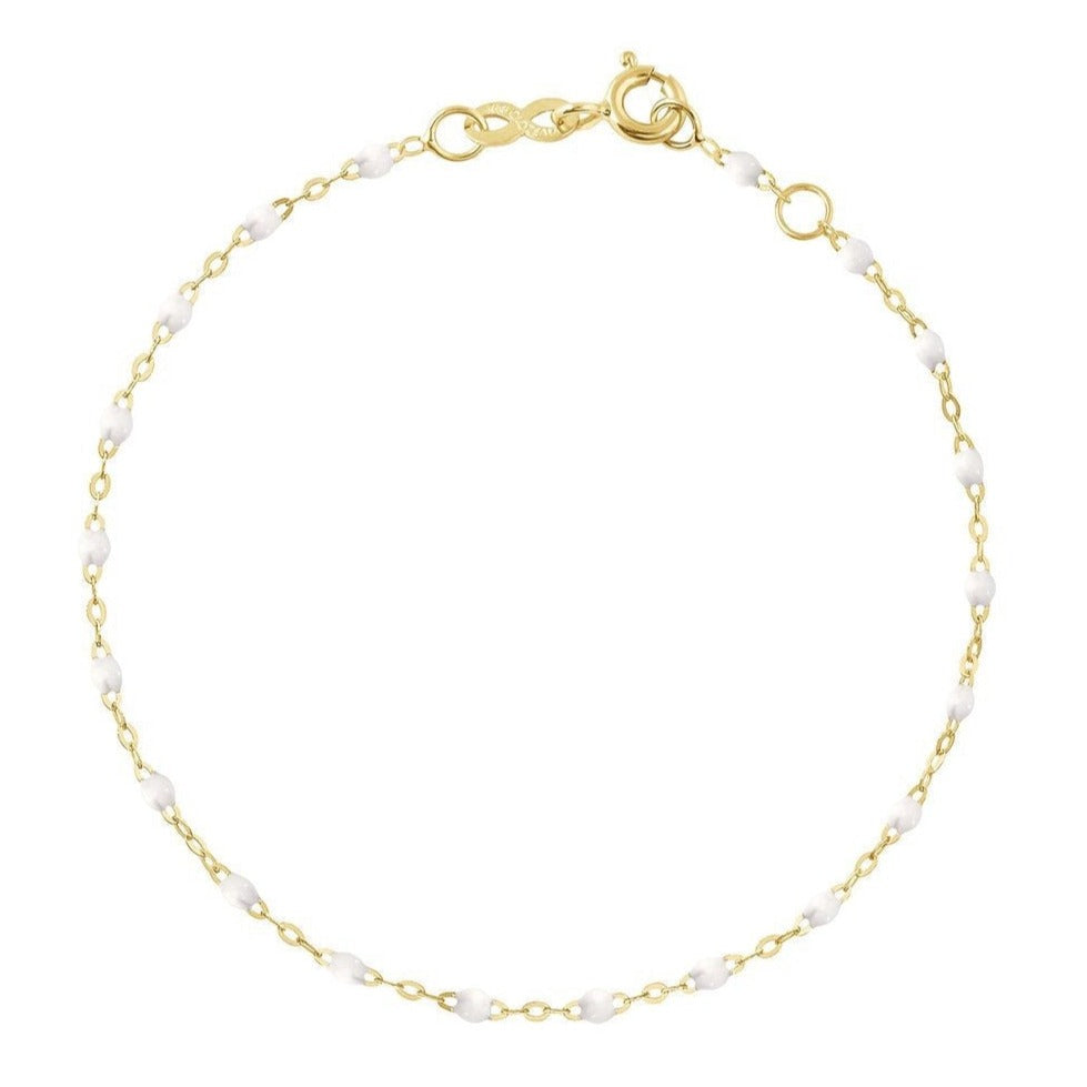 18 carat Yellow Gold Gigi Clozeau Classic Gigi Bracelet, 6.7" with small white beads spaced evenly throughout, isolated on a white background.