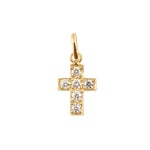 The Gigi Clozeau Cross Diamond Pendant from Gigi Clozeau features a timeless design with a cross adorned with eight small diamonds.