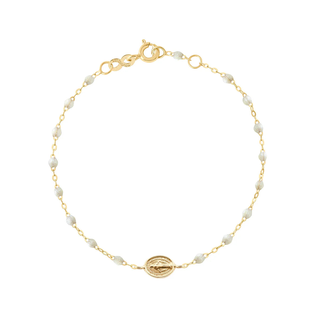 The Madone Charm Bracelet 6.7" by Gigi Clozeau is crafted in 18k gold with refined resin pearls, an oval medallion charm, lobster clasp, and adjustable links.