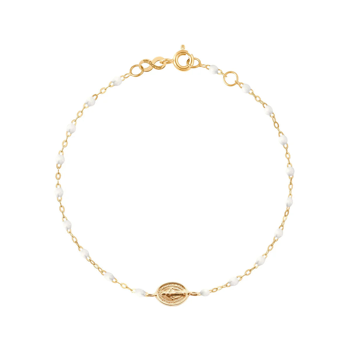 The Madone Charm Bracelet 6.7" by Gigi Clozeau features elegant resin pearls, a round medallion charm, and is crafted from 18k gold with a secure lobster clasp.