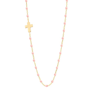Gold chain necklace featuring small pink resin pearls and an off-center cross. Inspired by the Gigi Clozeau Side Cross Necklace 16.5".