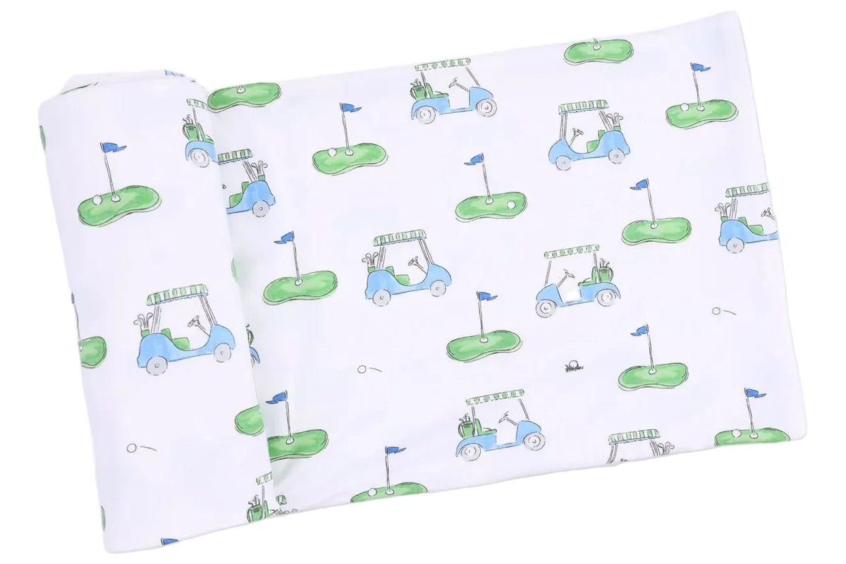 Featuring a playful white fabric adorned with repeating blue and green golf carts, golf greens with flags, and golf balls, the Angel Dear Swaddle Blanket offers a fun design perfect for your little one. Crafted from Viscose from Bamboo, this blanket combines exceptional softness and breathability to provide ultimate comfort for your baby.