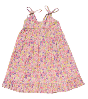 The Girls’ Alena Dress by Early Sunday is a sleeveless summer dress featuring playful shoulder ties, a pink ruffle hem, and a vibrant multicolored floral pattern—crafted from soft organic cotton for all-day comfort.