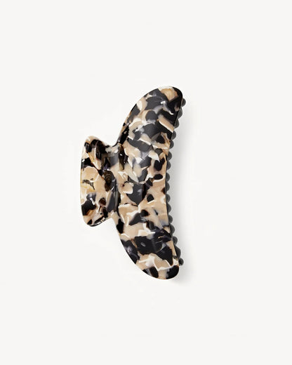 The Machete Grande Heirloom Claw is a large, handcrafted Italian acetate hair clip with a black, beige, and brown tortoiseshell pattern and double-walled build, shown on a plain white background.