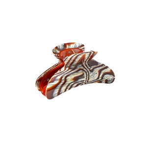 The Grande Heirloom Claw by Machete is a brown and white marbled hair claw clip made from Italian acetate, ideal for securing full updos and shown against a white background.