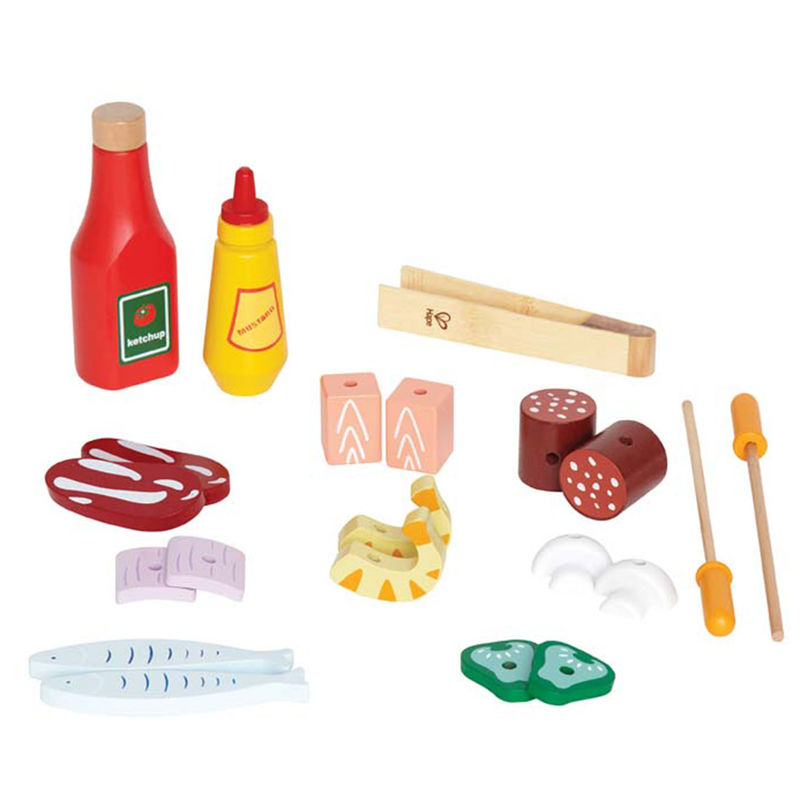 A Hape Gourmet Grill featuring a toy collection of various condiments and food items, including ketchup, mustard, sushi, vegetables, and utensils designed for pretend play on a gourmet grill with double-sided grates.