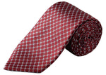 The Eton Geometric Woven Silk Tie is a rolled-up red jacquard accessory patterned with a repeating white micro geometric diamond motif, making it an ideal choice for formal occasions.