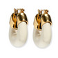 Lizzie Fortunato's Organic Mini Gold Hoops feature gold-plated tops and white curved lower halves, shown against a white background.