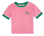 Bonton Girls’ Livia T-Shirt in Pink Fiesta, crafted from 100% cotton, features short sleeves, green trim, white wavy edges, and a delightful banana embroidery on the chest. Designed with three buttons on the left shoulder for easy dressing.