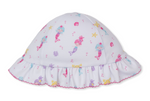 The Underwater Mermaids Floppy Hat by Kissy Kissy is crafted from soft Pima cotton and features a colorful underwater mermaid print with sea creatures, a ruffled brim, and pink stitching along the edge.