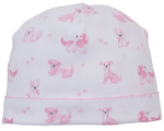 The Kissy Kissy Puppy Paws Printed Hat is crafted from ultra-soft Pima cotton and showcases a charming pattern of small pink cartoon puppies and puppy paws scattered across the fabric.