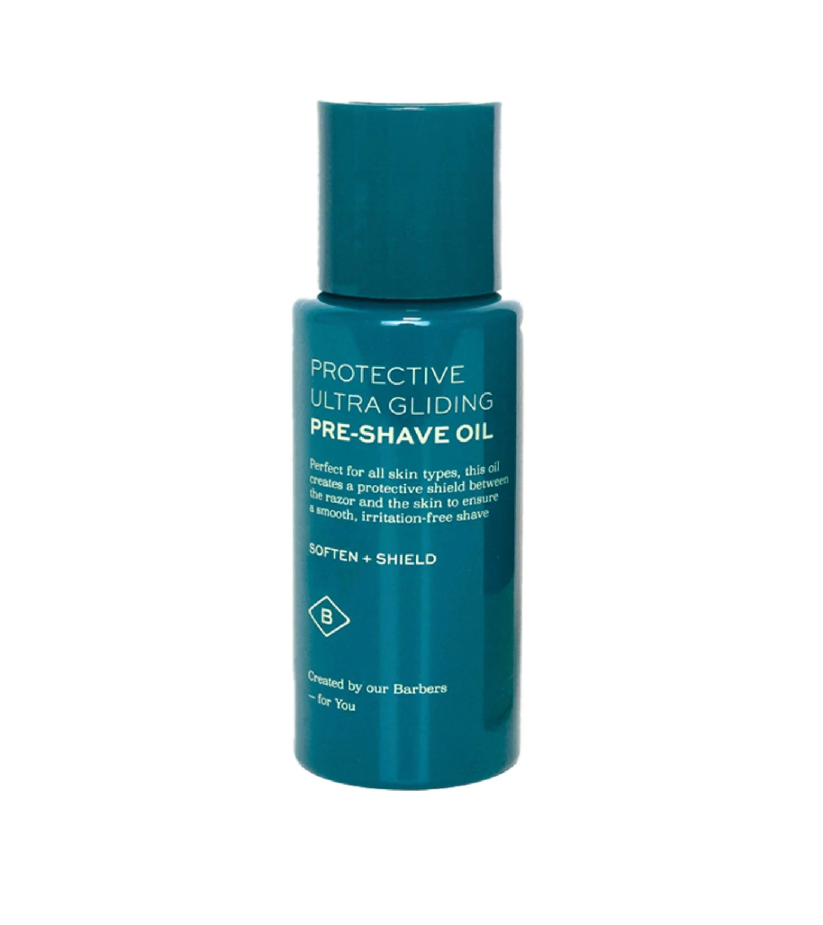 Barberino's Protective Ultra Gliding Pre-Shave Oil is a teal bottle with white text, suitable for all skin types. It softens and shields skin before shaving, ensuring smoother shaves and enhanced razor glide.