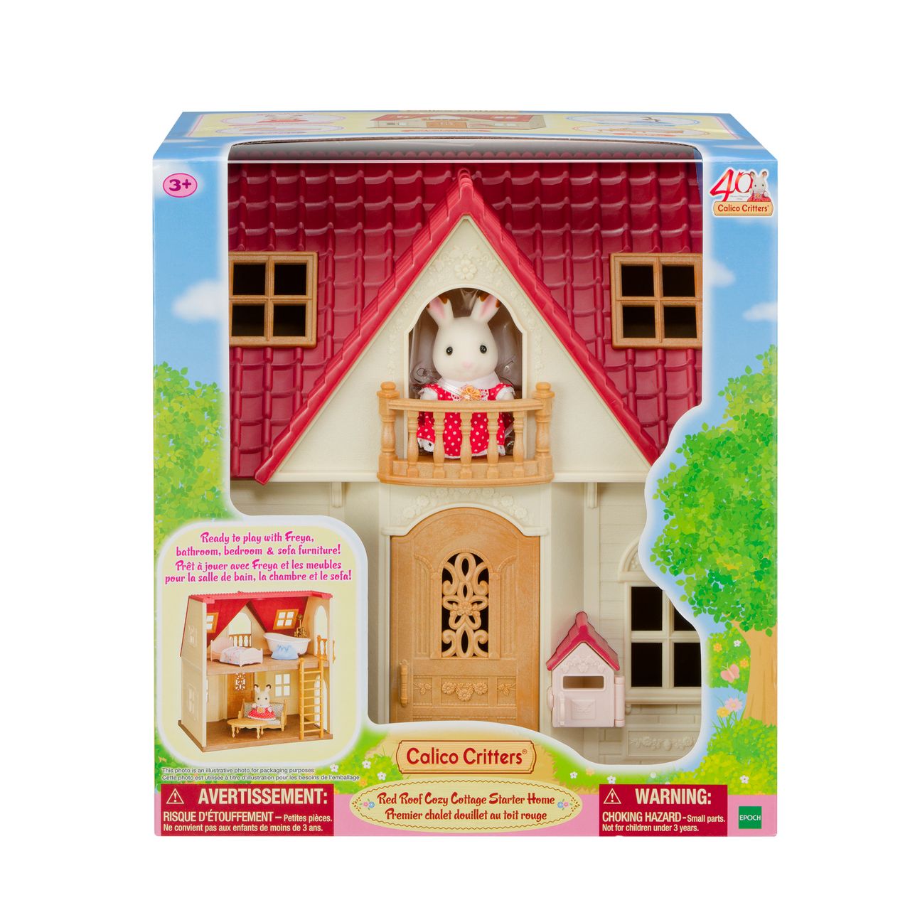 Boxed Calico Critters Red Roof Cozy Cottage, showcasing a Chocolate Rabbit Girl figure on the balcony and a beautifully displayed, charming interior on the packaging.