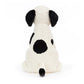 Jellycat Harper Pup, a black and white stuffed dog toy on a white background.