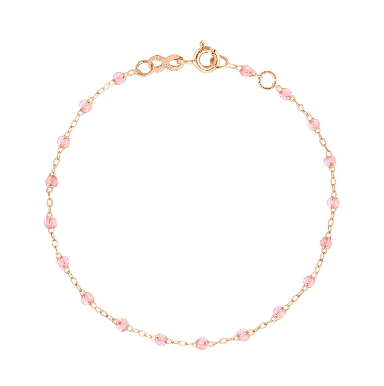 The Gigi Clozeau Classic Gigi Bracelet 6.7" from Gigi Clozeau showcases an exquisite gold chain made from 18-carat yellow gold, embellished with delicate pink beads and secured by a reliable clasp, achieving a perfect harmony of style and sophistication.