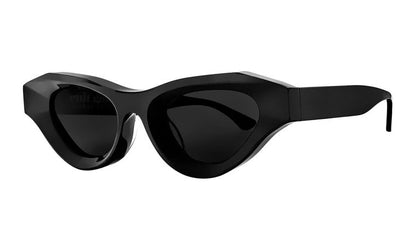 These Thierry Lasry Jaya Sunglasses with thick frames and dark tinted lenses are a chic addition to any eyewear collection. Perfectly embodying the avant-garde style of Thierry Lasry, they effortlessly combine fashion and function.