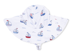 The Angel Dear Baby Wide Brim Sun Hat features a charming blue and red sailboat print, a chin strap for a secure fit, and gently wavy brim edges—making it an ideal choice for keeping your little one cool and protected on sunny days.