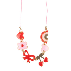 The Meri Meri Hearts & Cherries Enamel Charm Necklace by Meri Meri showcases a pink cord embellished with elegant enamel charms, including a heart, flower, bow, rainbow, and cherries.