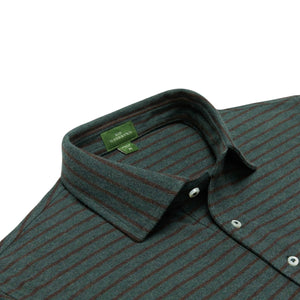 A close-up of the Sid Mashburn Heather Short-Sleeved Polo, featuring green and red stripes, a cut-and-sew collar, white buttons, and the brand label inside the collar.