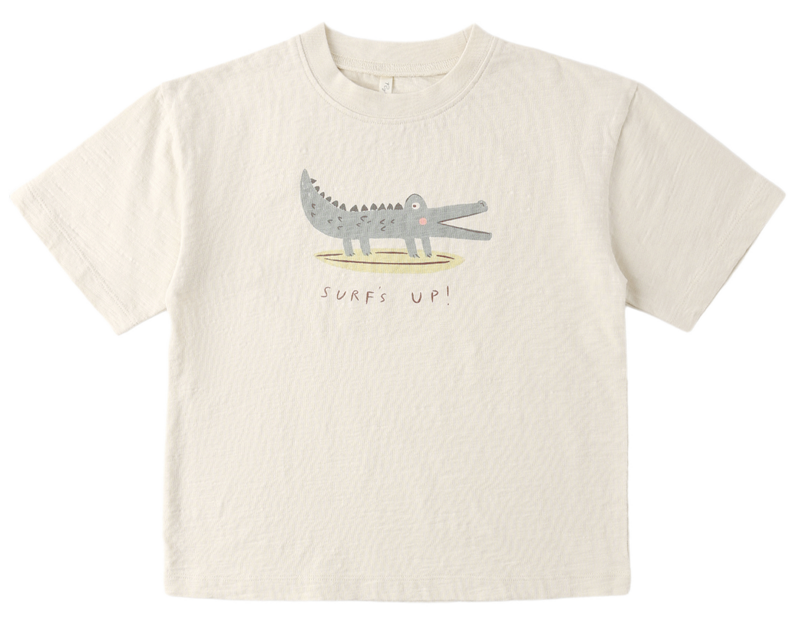 The Rylee & Cru Baby Boys' and Boys' Relaxed Tee is a beige cotton jersey shirt with a cartoon crocodile and “Surfs Up!” text, offering a comfortable fit for easy dressing.
