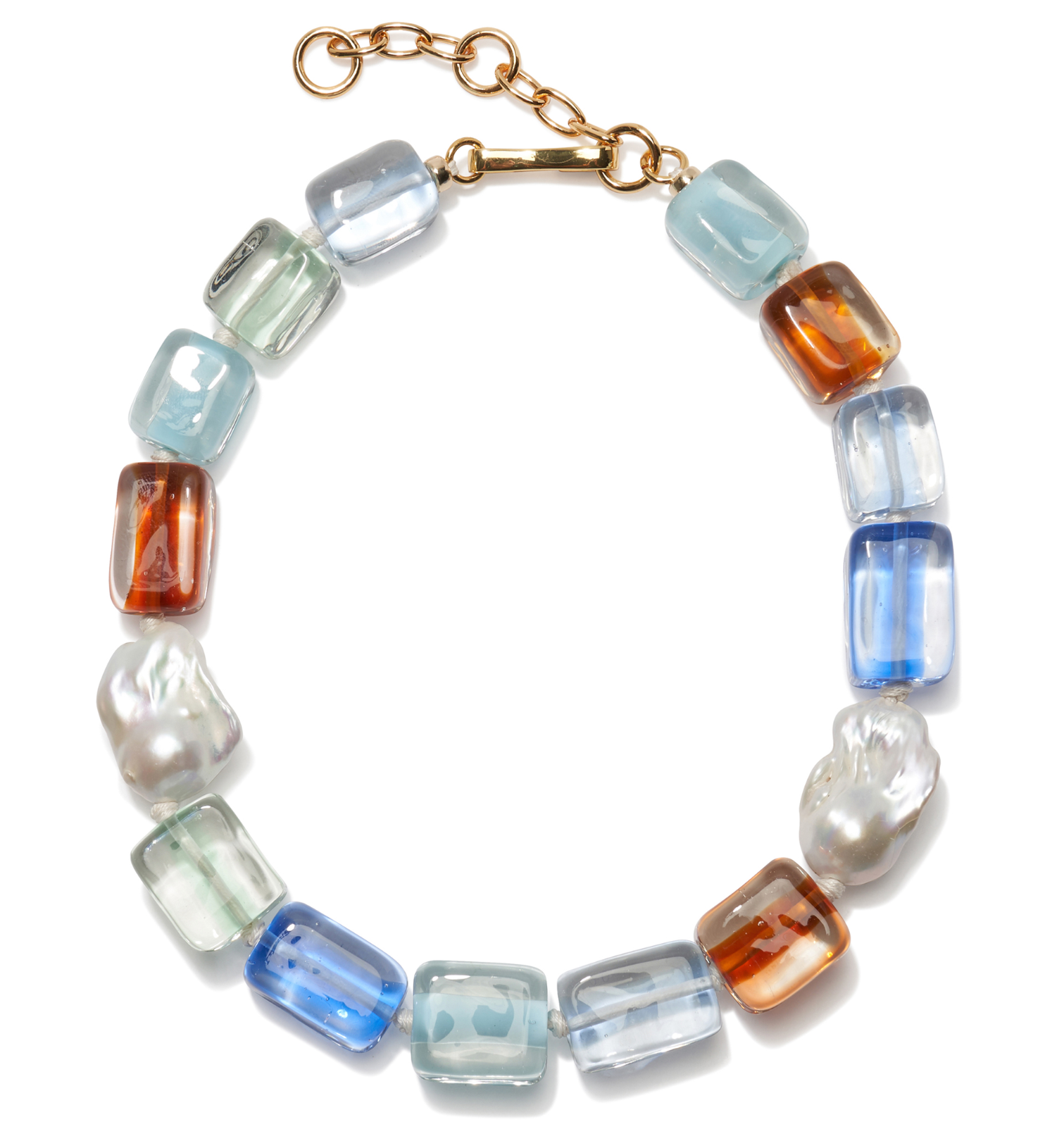The Delphine Collar by Lizzie Fortunato features rectangular handmade multicolored glass beads, two irregular white pearls, and a gold adjustable clasp, all arranged in a circle on a white background.