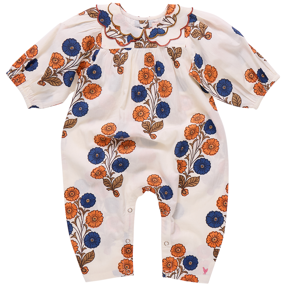The Pink Chicken Baby Girls' Dary Jumper is a white vintage one-piece romper with long sleeves, a scalloped collar, and Buttercup Floral orange and blue patterns.