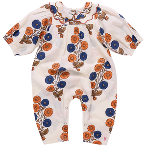 The Pink Chicken Baby Girls' Dary Jumper is a white vintage one-piece romper with long sleeves, a scalloped collar, and Buttercup Floral orange and blue patterns.