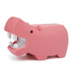 A pink plastic Halftoys Safari Friends hippopotamus-shaped tape dispenser with the tape being dispensed from its mouth.