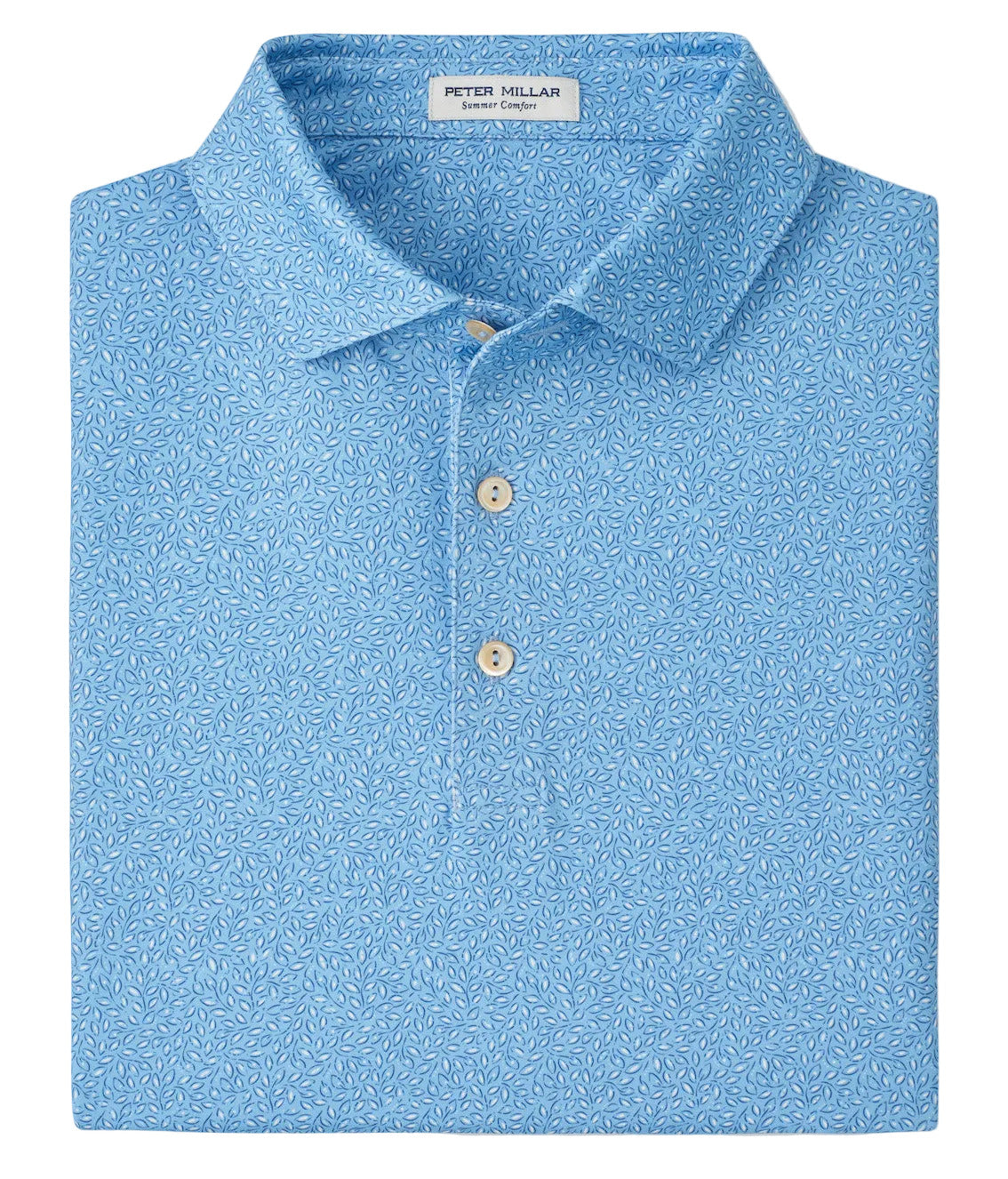 A folded light blue Peter Millar Magnolia Performance Jersey Polo with a subtle white floral pattern, two-button placket, and four-way stretch for all-day comfort.