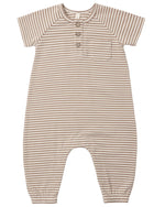The Quincy Mae Baby Short Sleeve Jumpsuit is a beige and white striped romper featuring three coconut buttons at the neckline for easy changes, a small chest pocket, and elastic cuffs at the ankles.