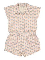 Girls’ Lola Terry Heart Overall by Louis Louise: a short-sleeve terrycloth romper featuring a collar, button front, and pockets, adorned with pastel pink, blue, and beige hearts on textured fabric.