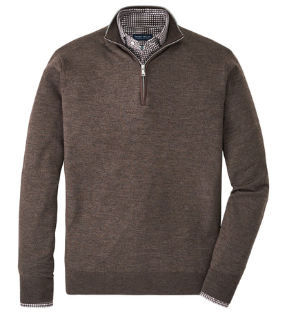 The Peter Millar Excursionist Flex Quarter-Zip Sweater in brown Merino wool is layered over a checkered dress shirt and displayed against a white background.