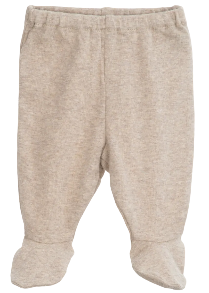 Serendipity Newborn Rib Pants with Feet, crafted from soft beige organic cotton, are designed for newborns and showcased on a plain white background.