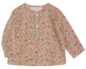 The Baby Light Woven Peasant Shirt by Serendipity is a long-sleeved children’s shirt made from GOTS certified organic cotton, featuring a pink, green, and brown floral pattern, two tagua nut buttons at the front, and a round neckline.