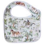 The Perfect Bib by Timo & Violet: a white muslin bib with a pastel horse and rider print, green foliage, flowers, and snap closure for stylish and comfortable mealtimes.