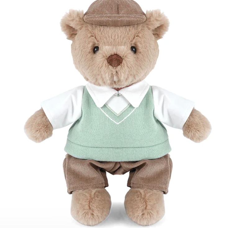 Bogey Golf Bear by Mon Ami stands upright against a white background, dressed in a brown cap, green sweater vest over a white shirt, and brown pants—this cuddly stuffed animal adds charming country-club style to any collection.